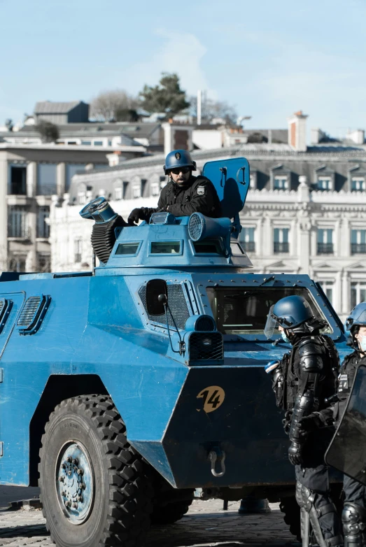 a police armored vehicle sitting in the middle of a street