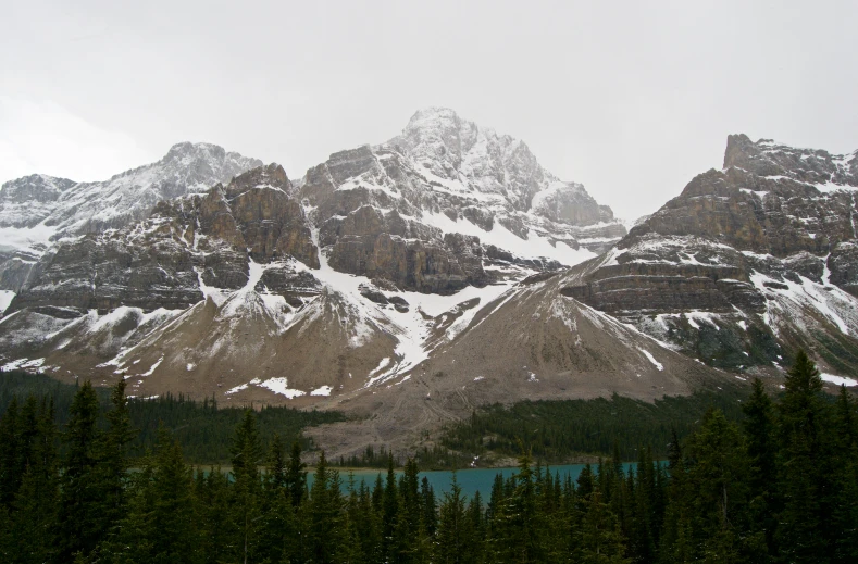 a majestic mountain landscape with snow on top