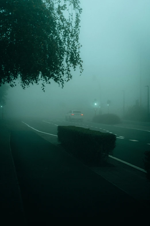 an overcast day and cars on the road