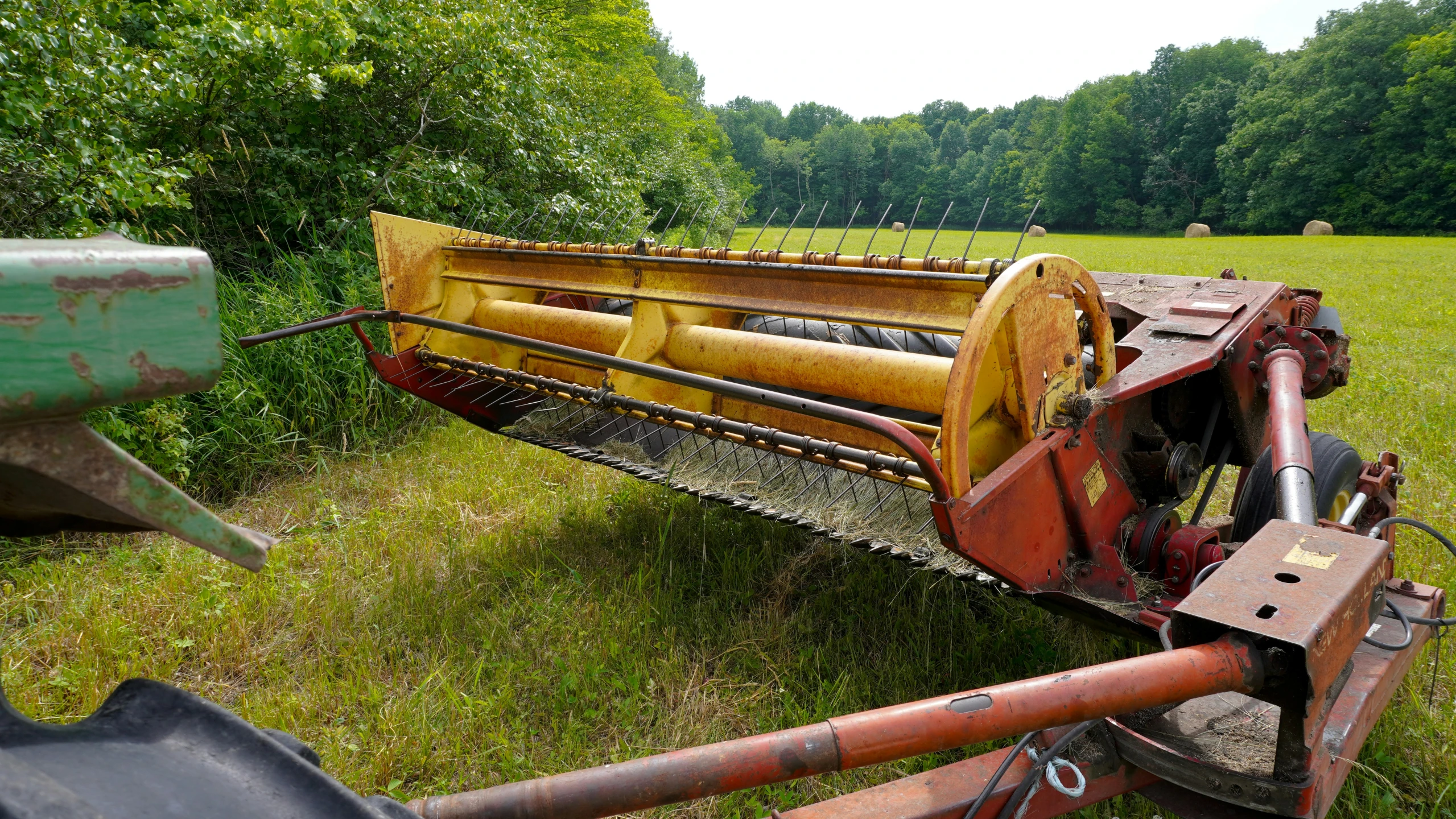 a tractor with a couple of wooden wheels on it