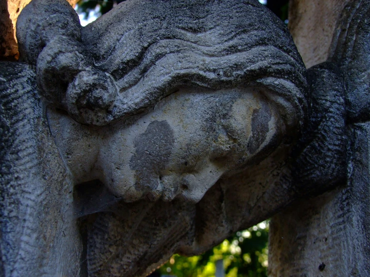 an unusual looking statue made out of concrete