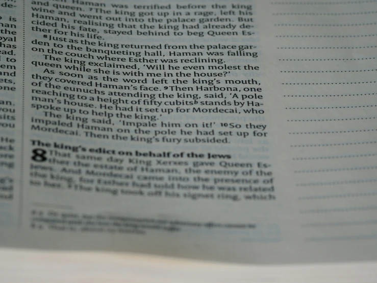 a close up of the page of a newspaper with words on it