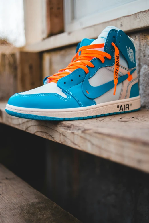 a pair of shoes sits on a ledge