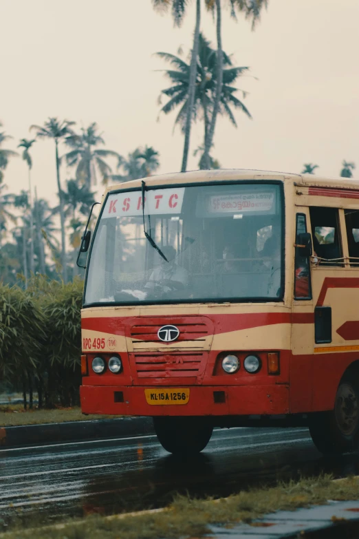 a bus traveling down the road during the day