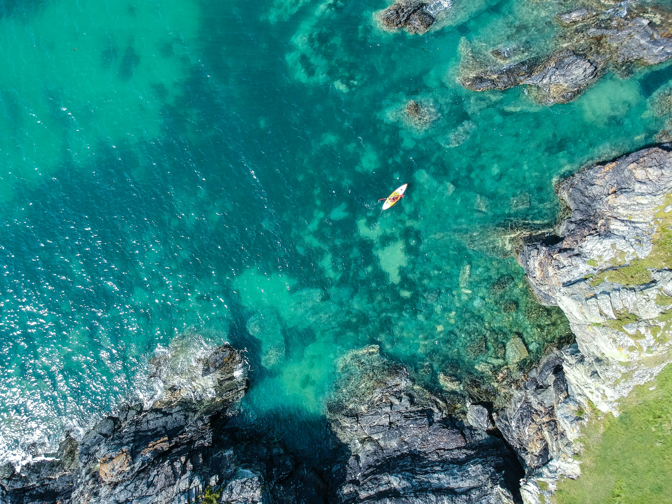 the water is blue with green and white