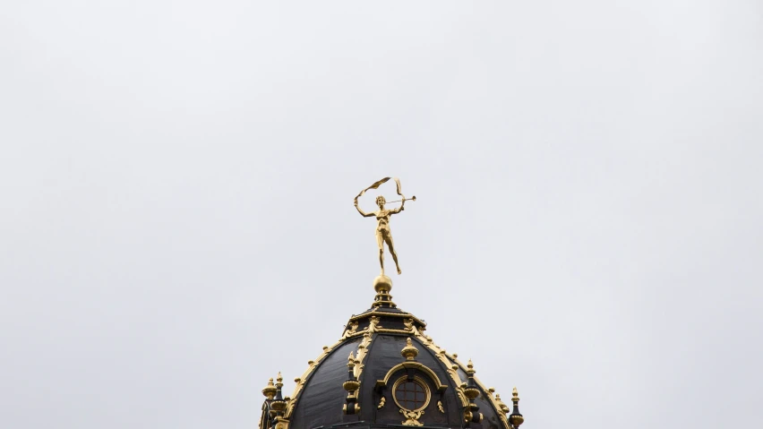 the view of the top of a clock tower