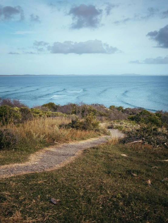 the road near the beach runs across the ocean