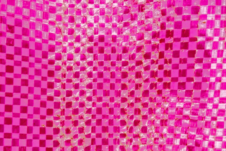 an image of a checkered design with red and pink colors