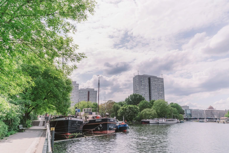 two boats are docked next to each other in the water