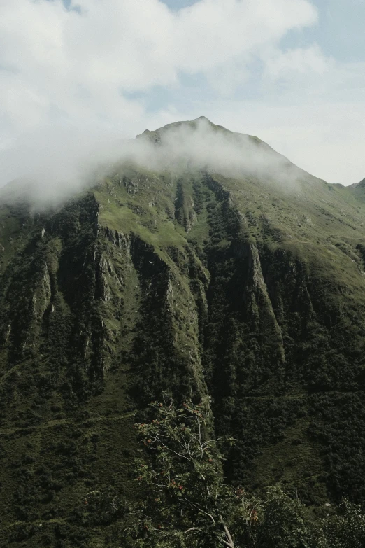 some fog and low clouds on a mountain range