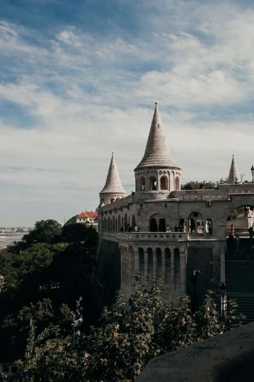 people on the top of a tower of a building