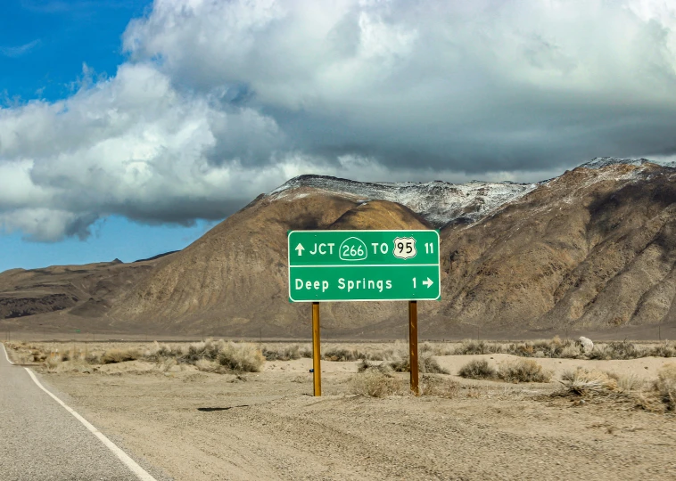 a highway sign on the side of the road