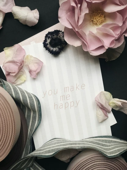a card that says, you make me happy surrounded by some yarn