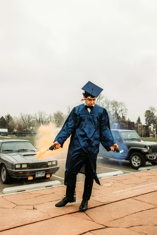 a man is dressed up as a graduate walking through the street