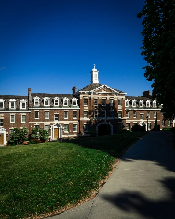 a large, tall building in a big field