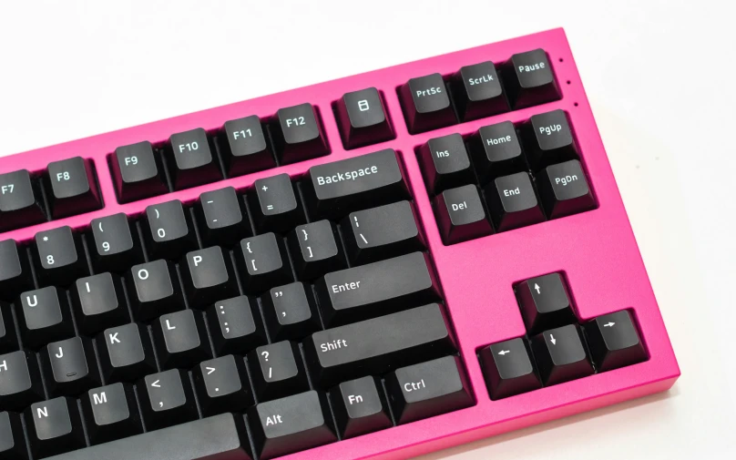 a close up po of a bright pink keyboard