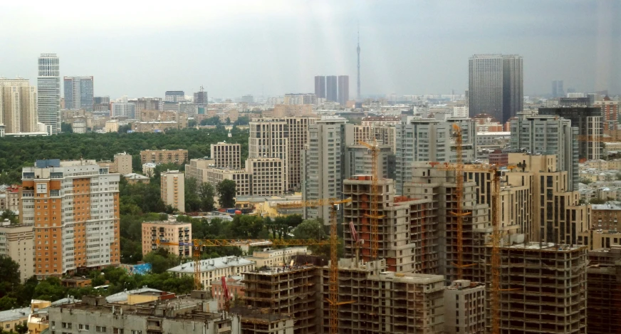 some buildings are seen from a very tall high rise