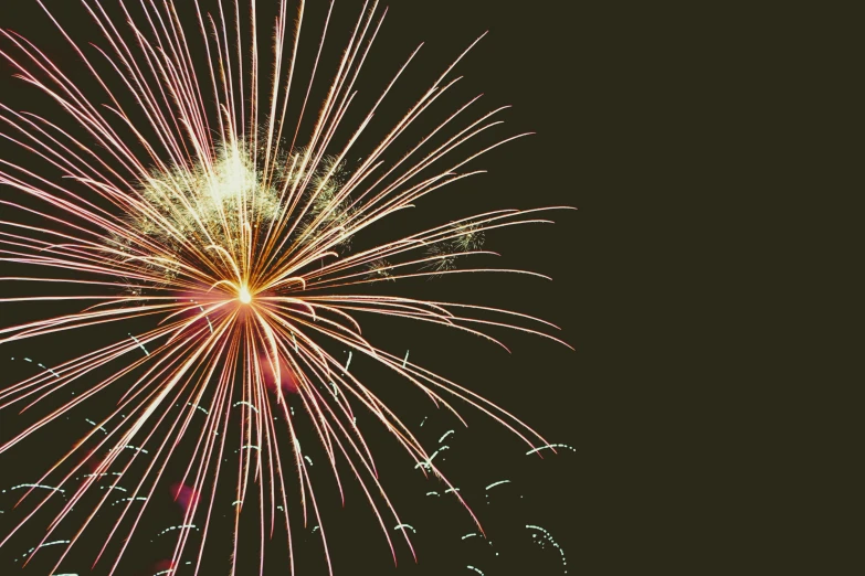 a colorful fireworks that is on display with a black background