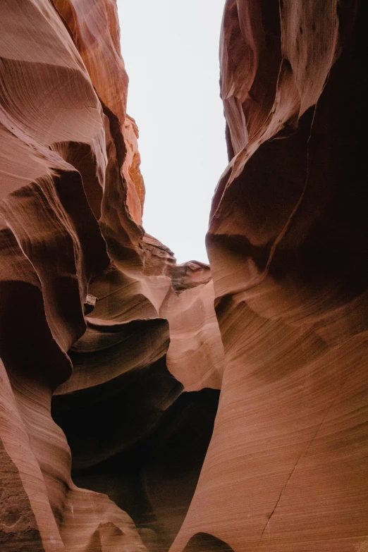 the entrance to a very large canyon that is very narrow