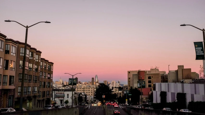 a city street with a lot of tall buildings