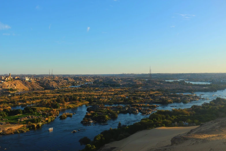 a wide river running along side of a city