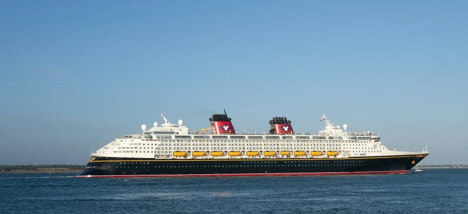 a large cruise ship near some very pretty piers