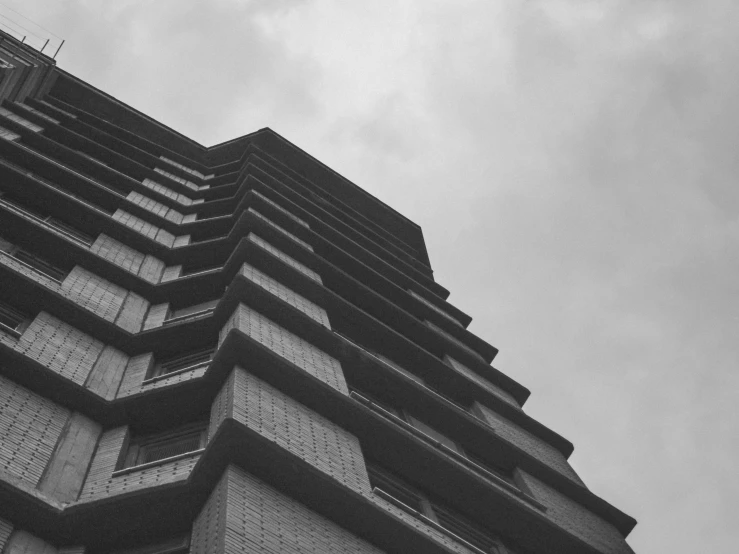 black and white pograph of the side of a tall building