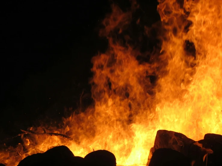 a fire lit by the sun has a large amount of yellow flames