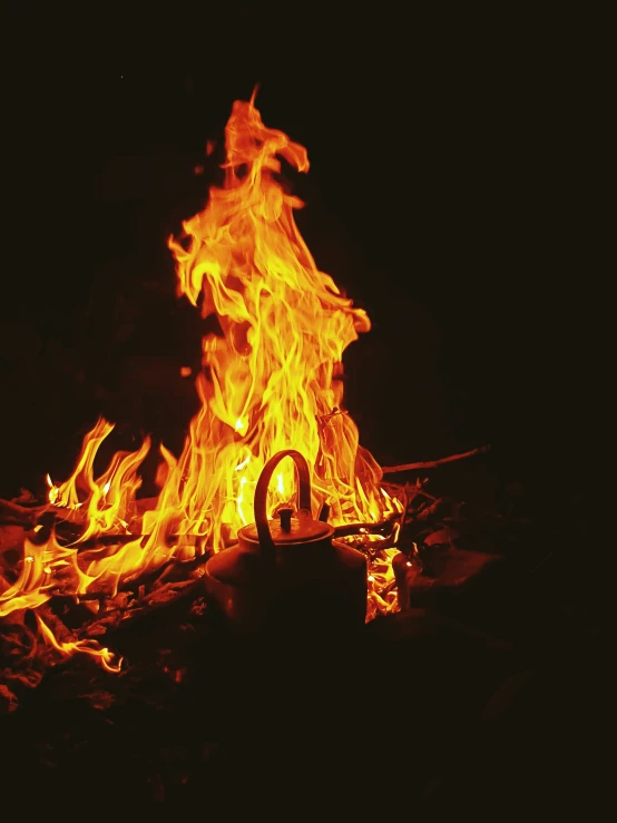 fire blazing up the side of a black background