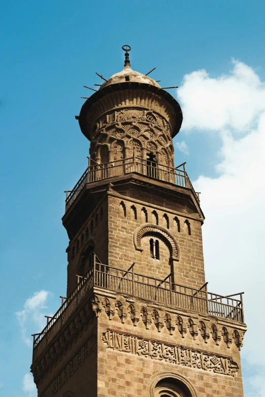 a large brick building that has a clock on top