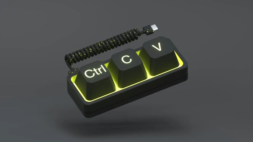 a computer keyboard with a keychain containing the word cv