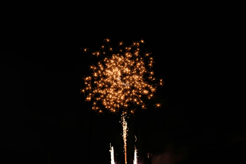 a view of fireworks exploding on a black background