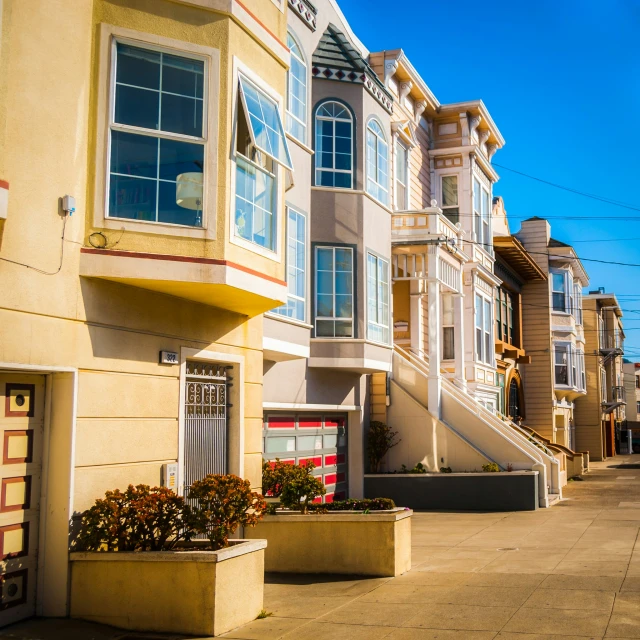 rows of houses line the streets in the sunlight