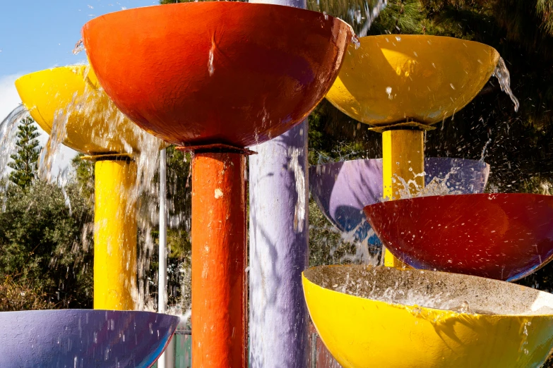 this is a water fountain with various colors and designs