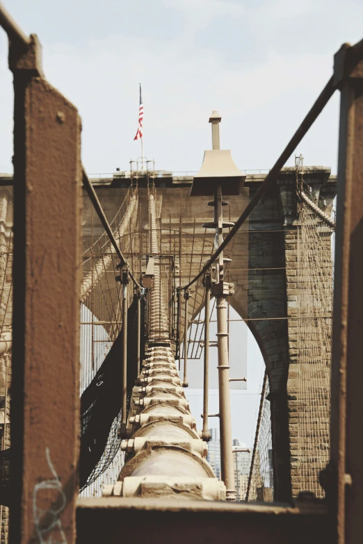 the view from below a bridge looking at soing on the ground