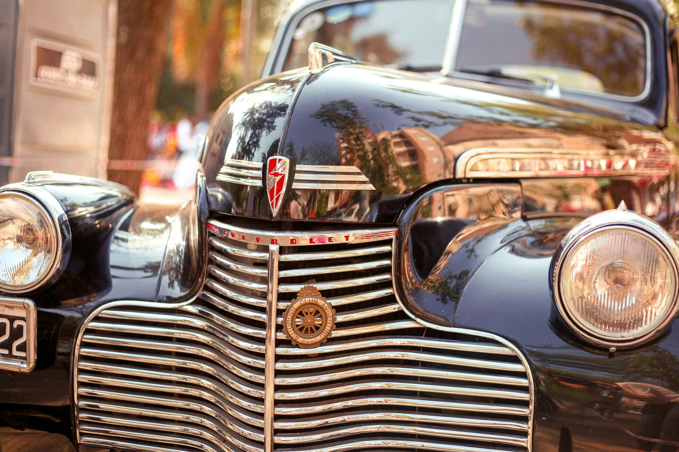 close up of the grill on an antique car