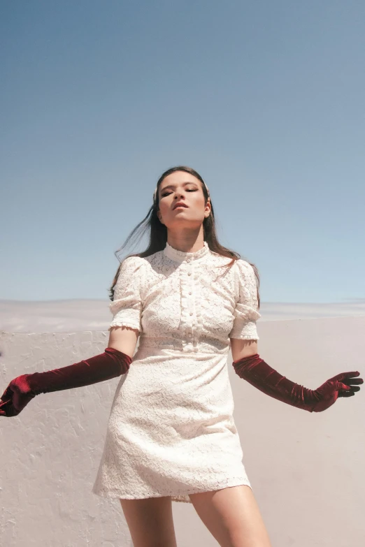 a woman is posing for the camera in the desert