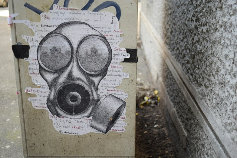 a painting of a gas mask with words on it