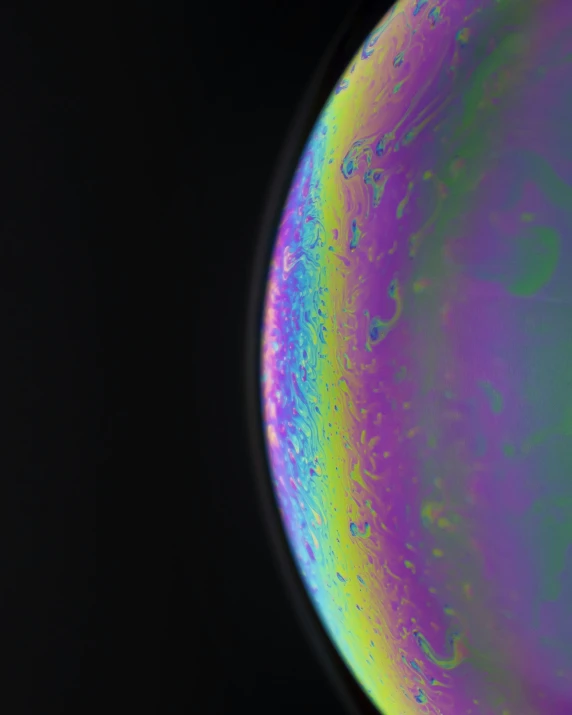 an image of a black, purple, and yellow area with water on it