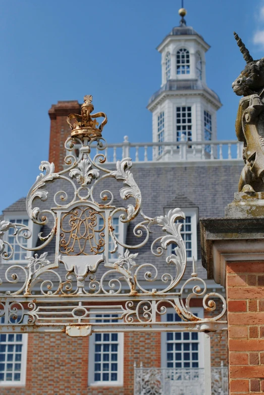 the ornate gates are decorated with gilded decorations