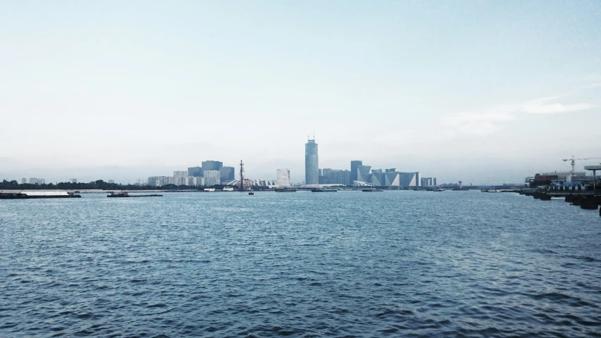 the city is in a large lake surrounded by tall buildings