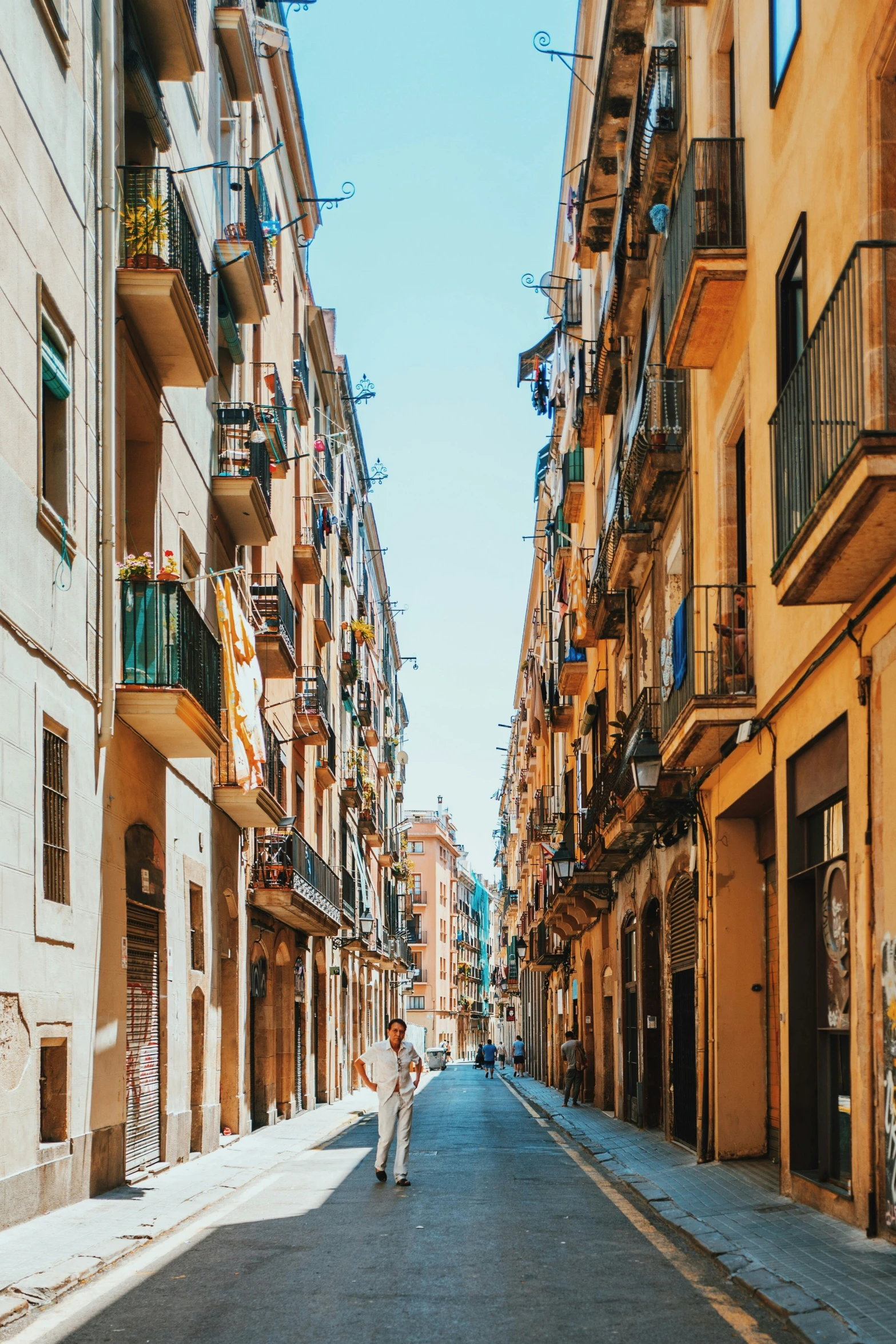 the person is walking on a empty street