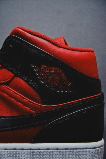 the nike air jordan 1 is a red and black shoe