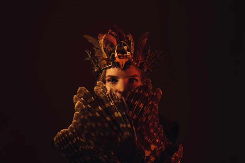 an image of a woman wearing a crown holding out a basket