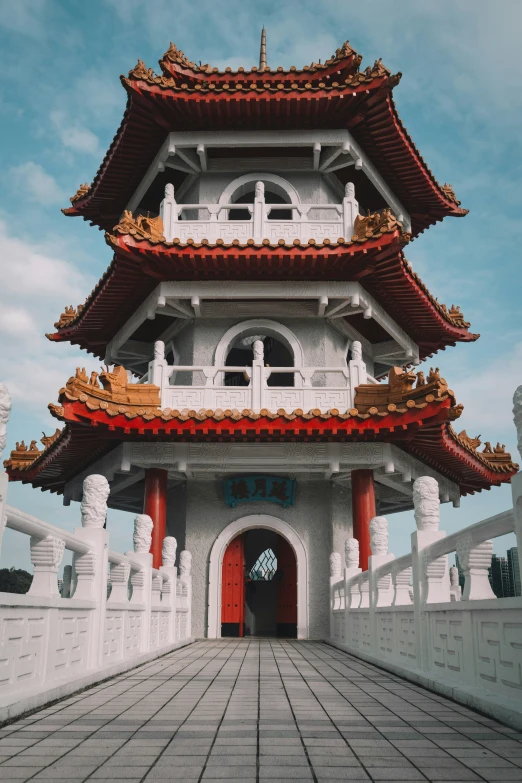 a large building sitting in front of a wall