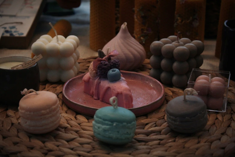 a tray with candle, candle holders and containers