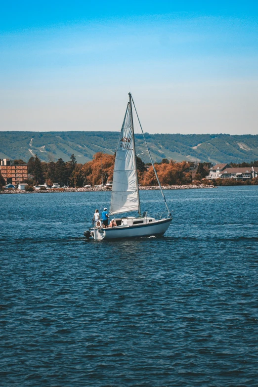 a sailboat that is out in the water