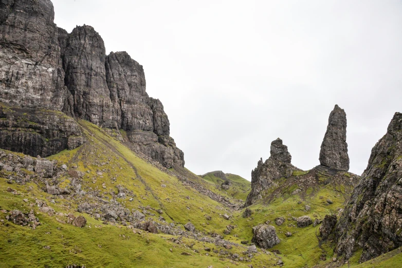 the mountain area is grassy and rocky with little vegetation