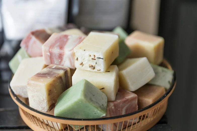 a large bowl filled with different types of fudge