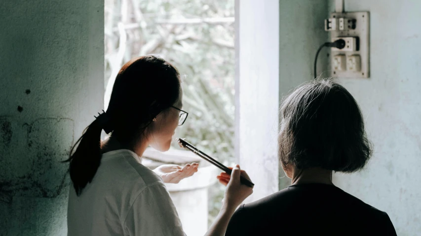 an image of a woman brushing her teeth